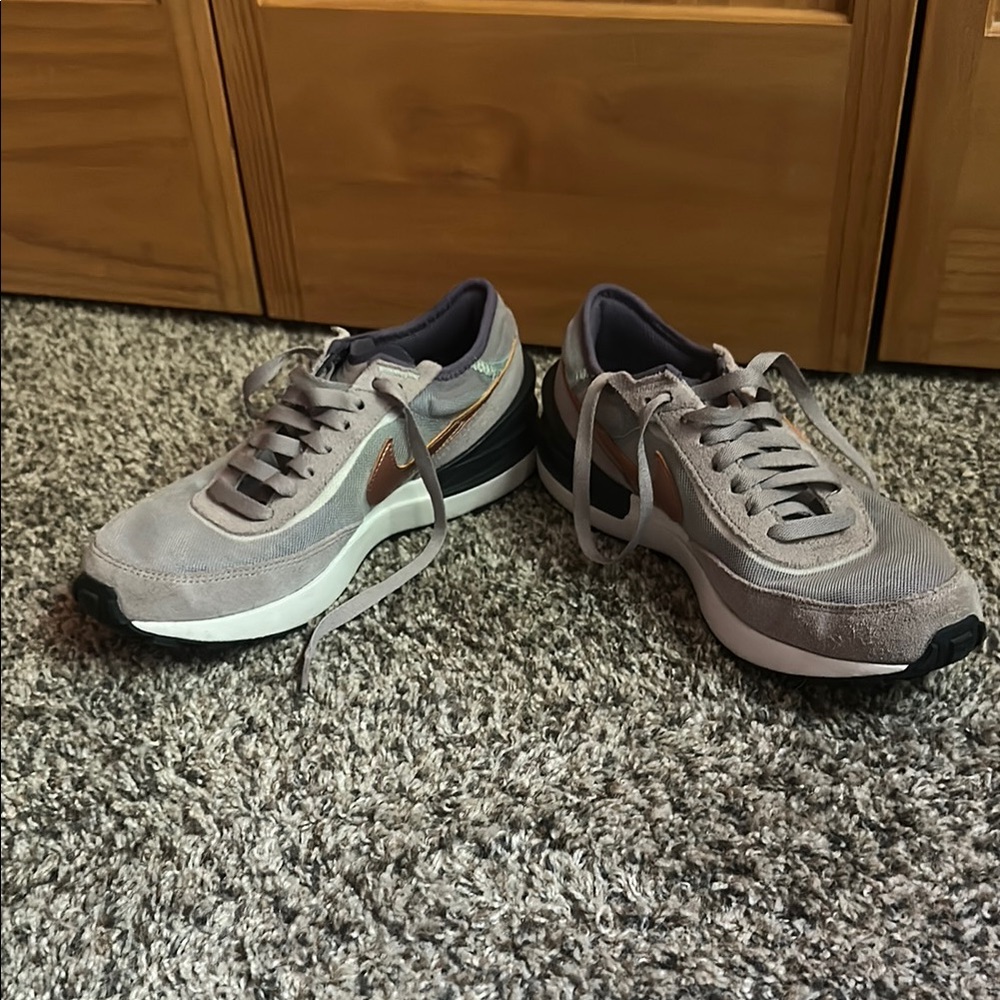 Women’s Nike shoes in light purple